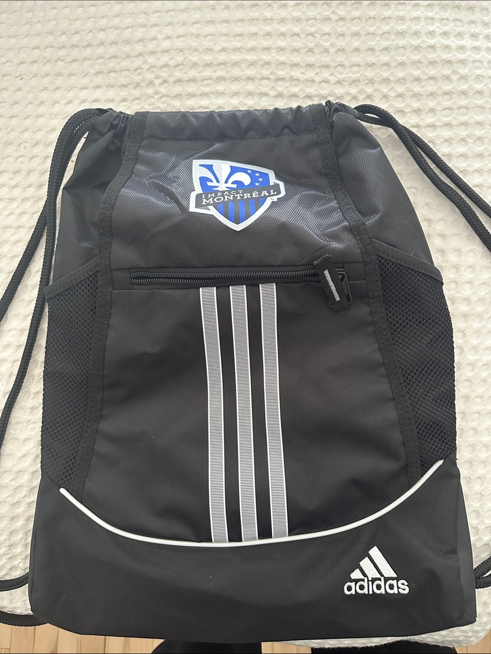 adidas Black Drawstring Backpack with Montreal Crest and White Accents
